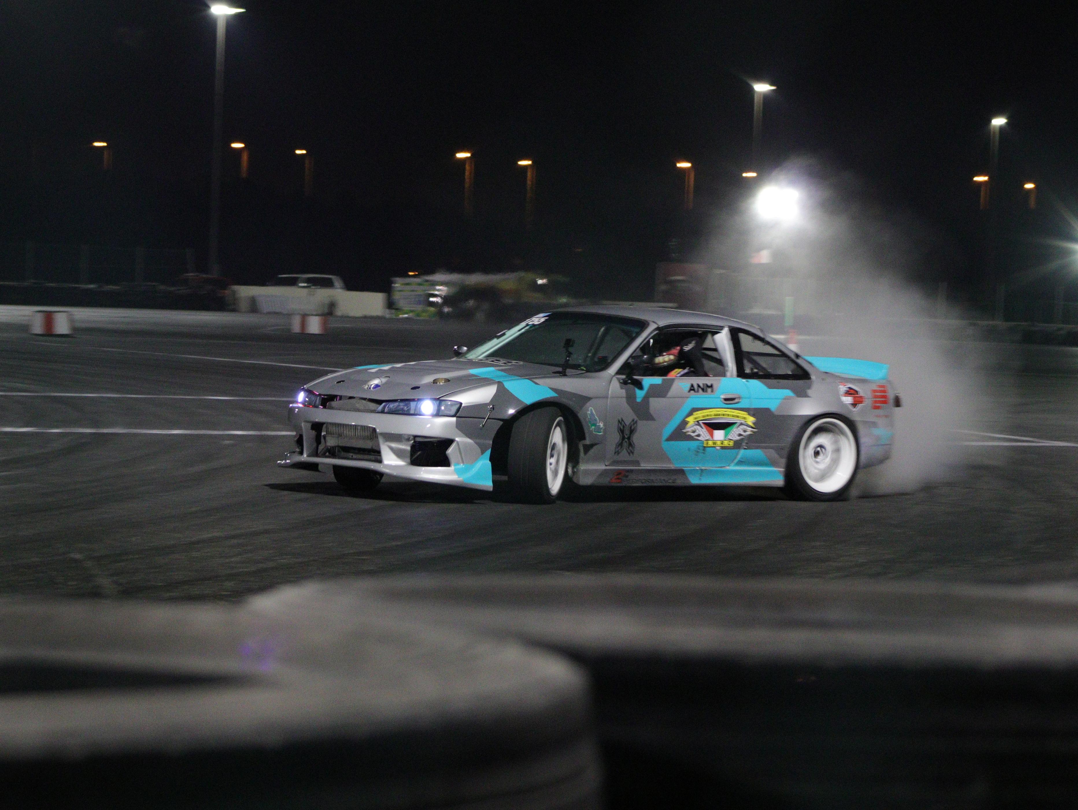 Cars drifting at Qatar Racing Club